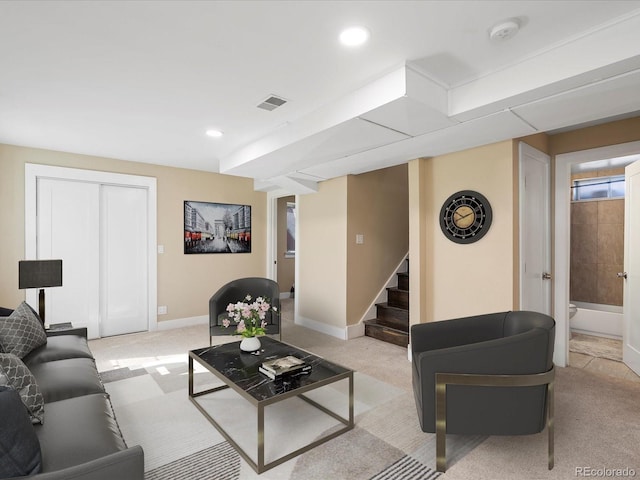 living area with stairway, baseboards, recessed lighting, and light carpet