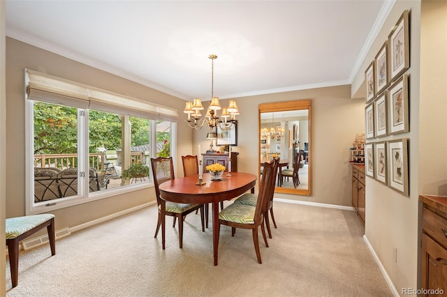 dining room with light colored carpet, crown molding, and a chandelier