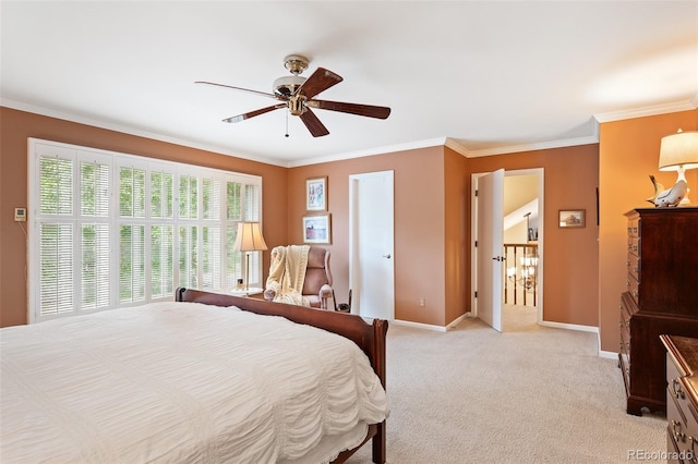 carpeted bedroom featuring crown molding and ceiling fan