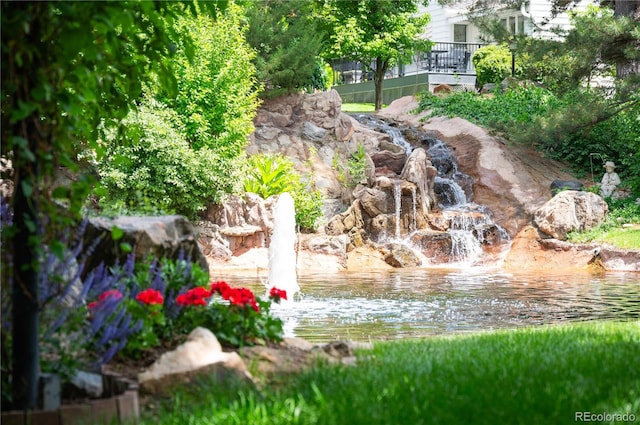 view of property's community featuring a water view