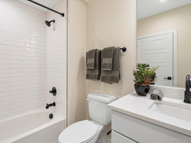 full bath with shower / bathtub combination, toilet, and vanity