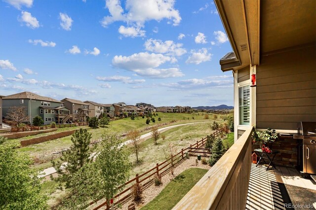 balcony featuring a residential view