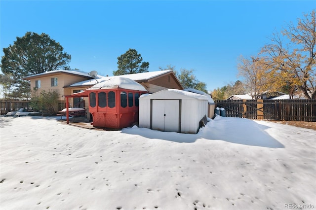 exterior space with a shed