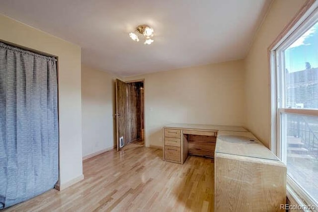 unfurnished bedroom featuring light hardwood / wood-style flooring