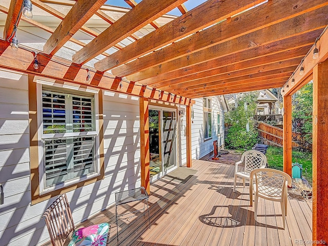 wooden terrace with a pergola