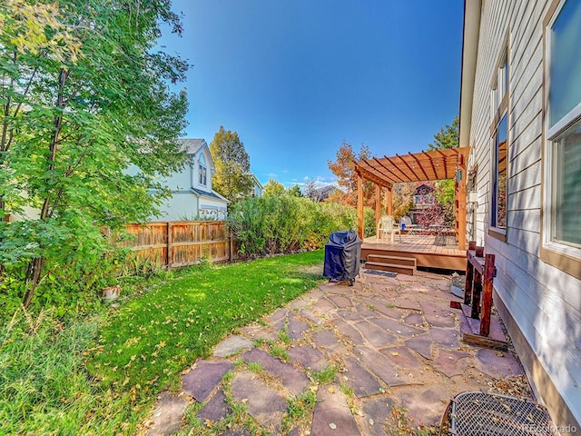 view of patio / terrace with a pergola and a wooden deck