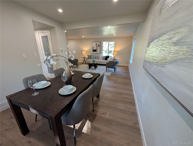 8129 S Yukon St S, Littleton, CO 80128 - dining space with wood finished floors and recessed lighting