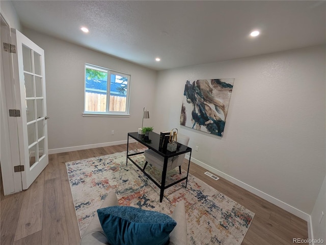 8129 S Yukon St S, Littleton, CO 80128 - office area featuring wood finished floors, recessed lighting, and french doors