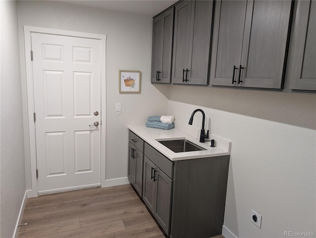 8129 S Yukon St S, Littleton, CO 80128 - laundry room featuring light wood-style floors and electric dryer hookup