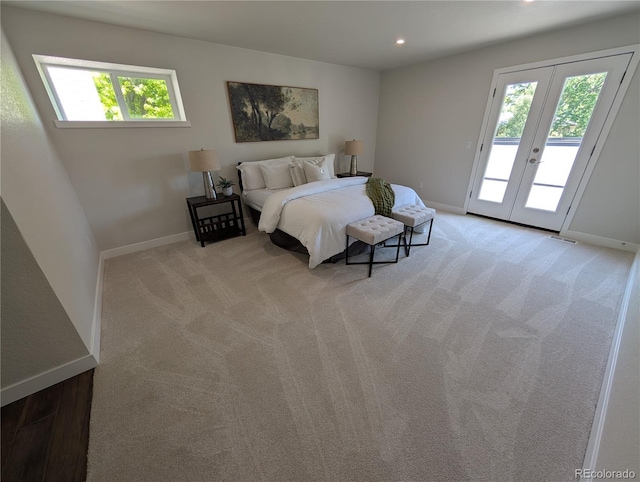 8129 S Yukon St S, Littleton, CO 80128 - bedroom with access to exterior, multiple windows, light colored carpet, and recessed lighting