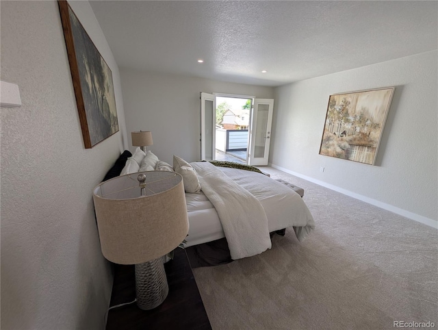 8129 S Yukon St S, Littleton, CO 80128 - bedroom featuring a textured ceiling, carpet floors, and recessed lighting