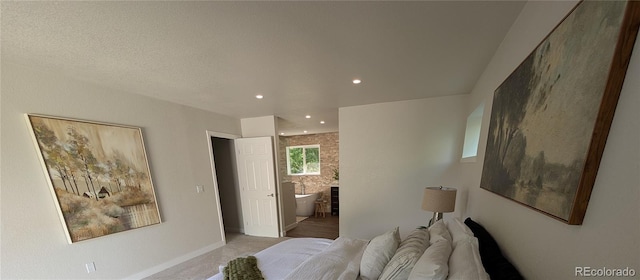 8129 S Yukon St S, Littleton, CO 80128 - bedroom featuring a fireplace, recessed lighting, and ensuite bathroom