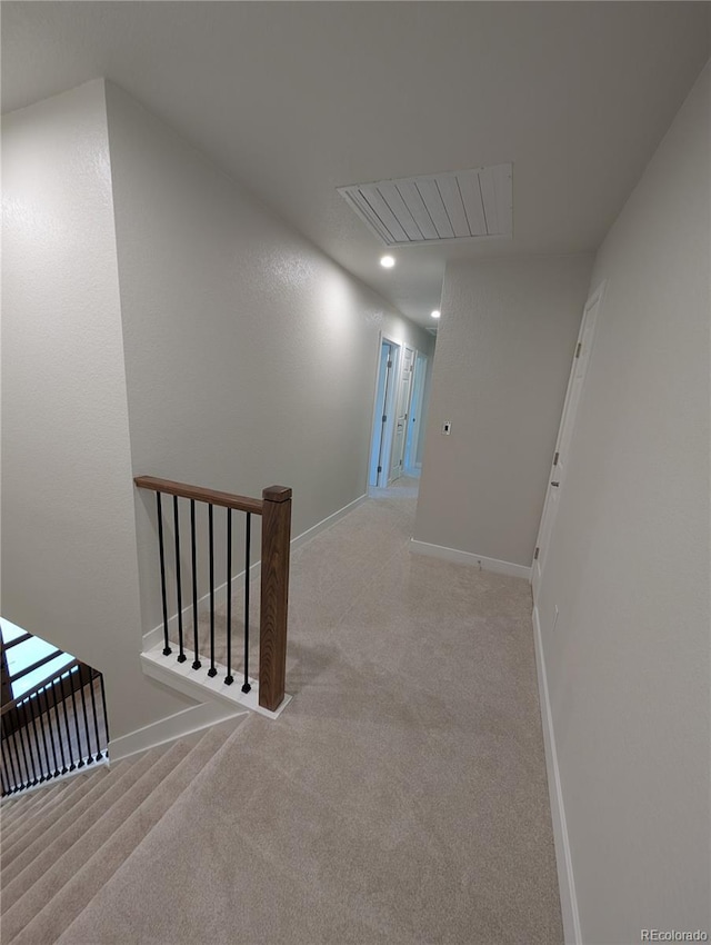 8129 S Yukon St S, Littleton, CO 80128 - corridor featuring an upstairs landing, carpet, and recessed lighting