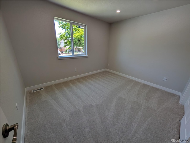 8129 S Yukon St S, Littleton, CO 80128 - empty room with light carpet and recessed lighting