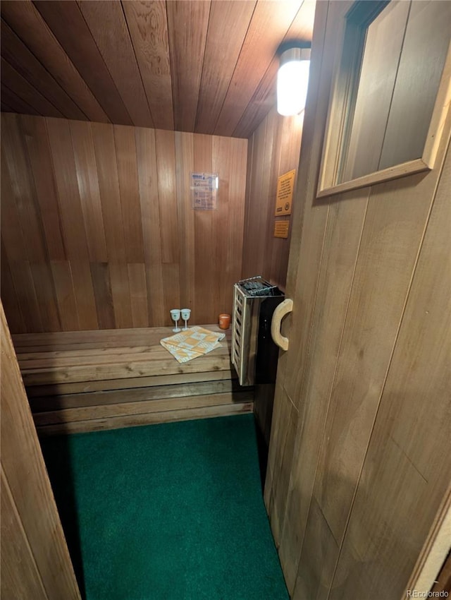 8129 S Yukon St S, Littleton, CO 80128 - relaxing sauna / steam room with wood walls, wooden ceiling, and carpet flooring