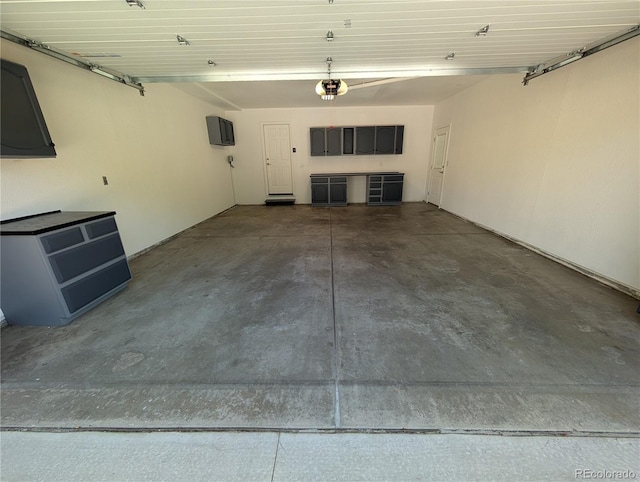 8129 S Yukon St S, Littleton, CO 80128 - garage featuring a garage door opener