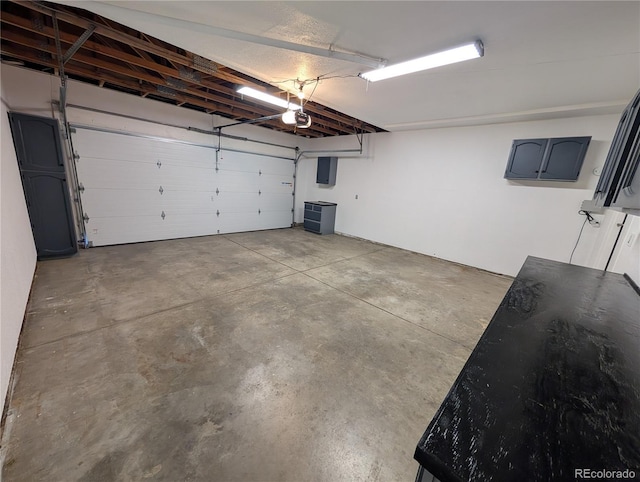 8129 S Yukon St S, Littleton, CO 80128 - garage with a garage door opener and electric panel