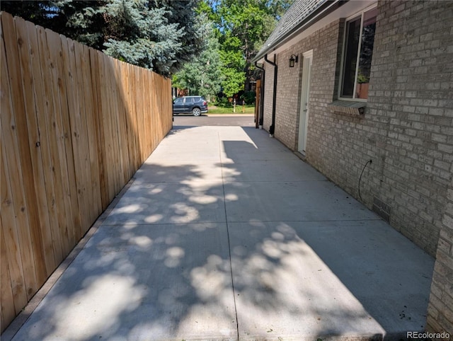8129 S Yukon St S, Littleton, CO 80128 - view of home's exterior with brick siding