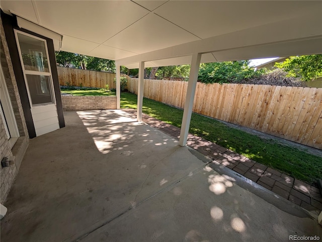 8129 S Yukon St S, Littleton, CO 80128 - fenced backyard featuring a patio area