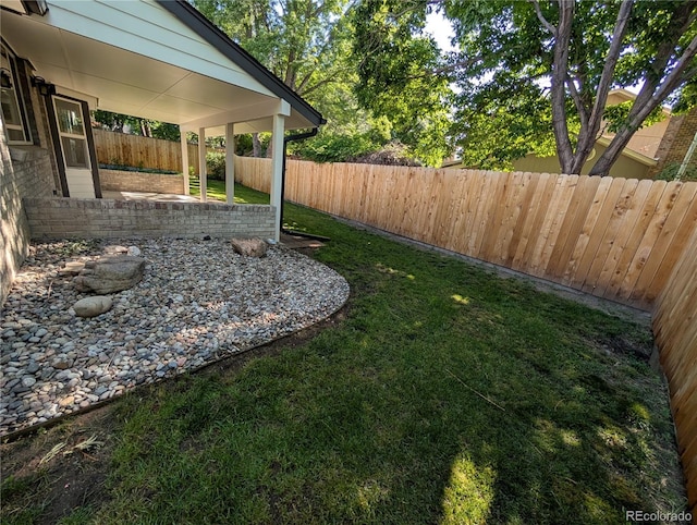 8129 S Yukon St S, Littleton, CO 80128 - fenced backyard featuring a patio