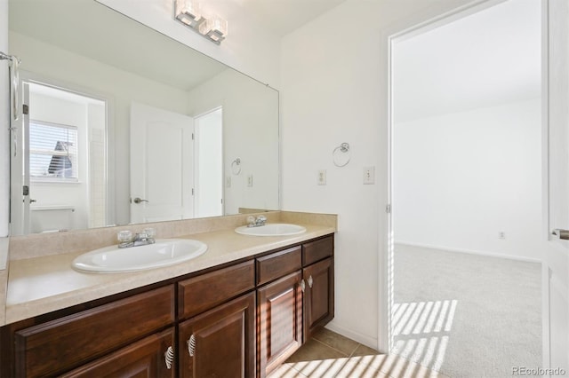 bathroom featuring vanity and tile patterned flooring