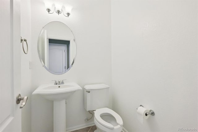 bathroom with sink and toilet