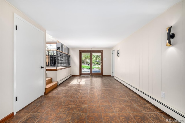 unfurnished living room featuring a baseboard radiator