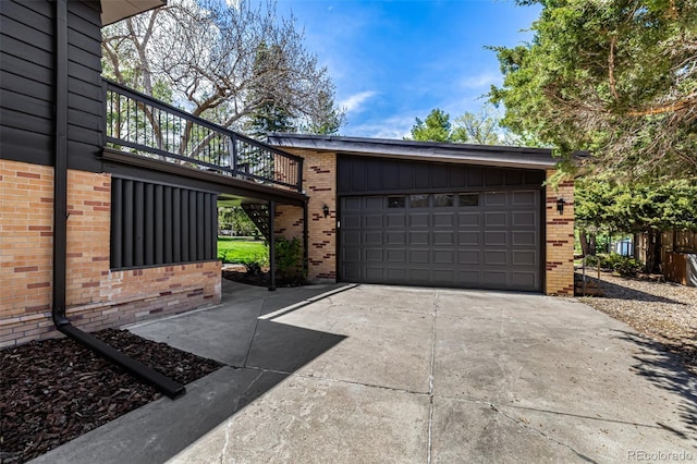 garage featuring driveway