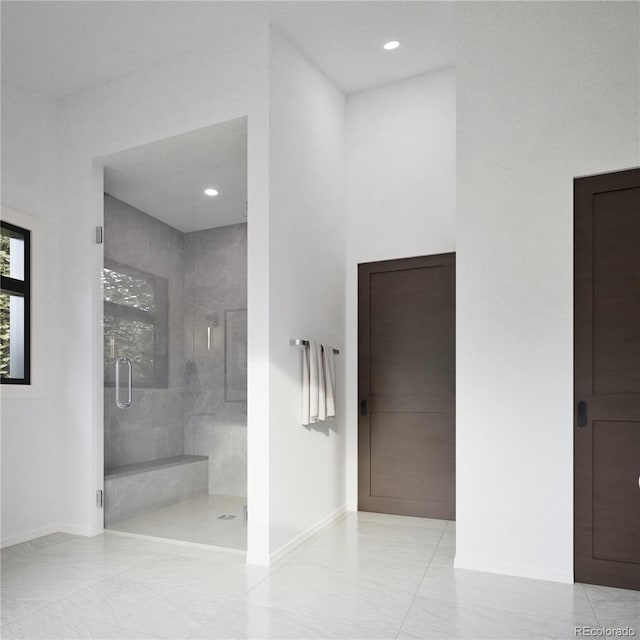 967 W Elk Meadows Dr, Tabernash, CO 80446 - full bathroom featuring a stall shower and baseboards