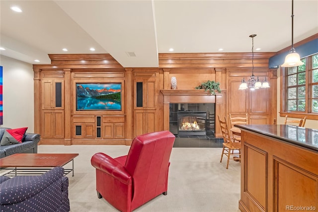living room featuring wooden walls, light carpet, a fireplace, visible vents, and recessed lighting