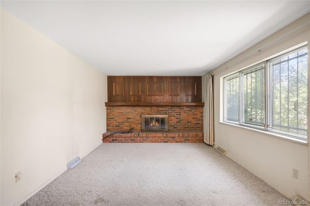 4184 S Syracuse St, Denver, CO 80237 - unfurnished living room with a fireplace and carpet floors