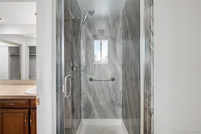 4184 S Syracuse St, Denver, CO 80237 - bathroom featuring a marble finish shower and vanity