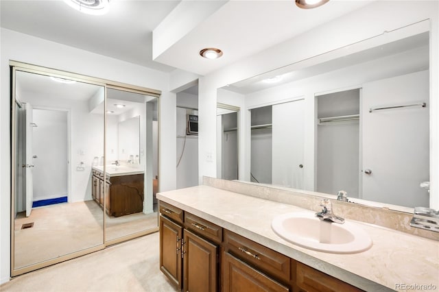 4184 S Syracuse St, Denver, CO 80237 - full bath featuring vanity and a spacious closet