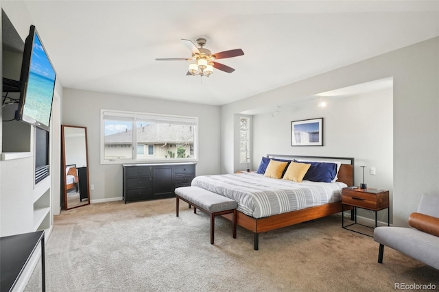 bedroom featuring baseboards, carpet floors, and ceiling fan