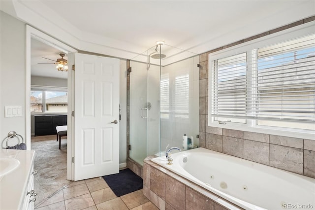 full bath with a stall shower, a whirlpool tub, tile patterned flooring, ceiling fan, and vanity