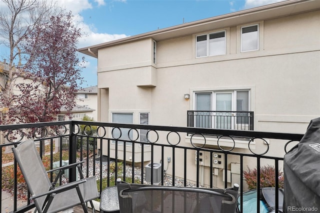 balcony featuring central AC unit