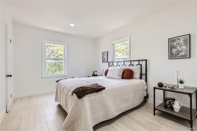 bedroom featuring light hardwood / wood-style floors