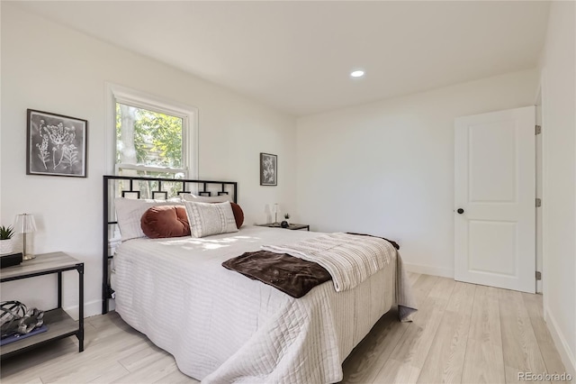 bedroom featuring light wood-type flooring