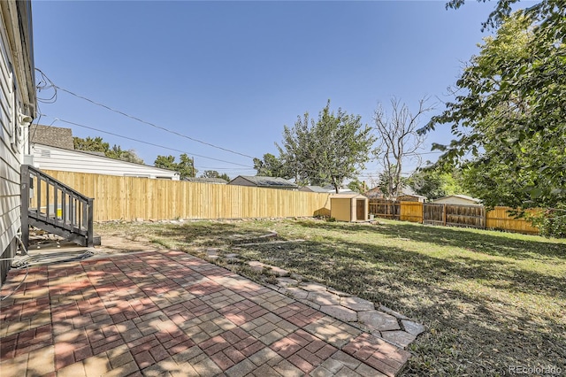 exterior space with a patio and a storage shed