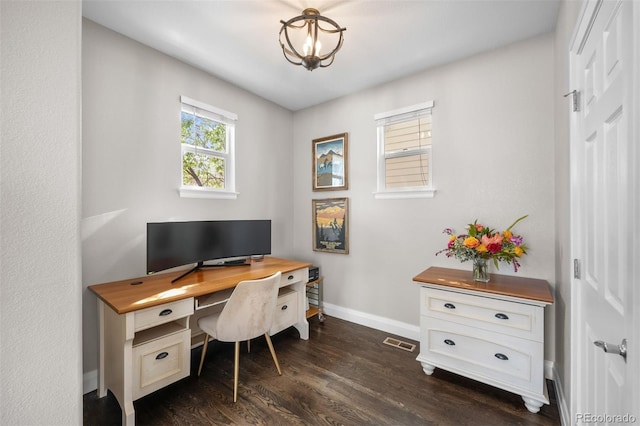 home office featuring baseboards, dark wood-style floors, and visible vents