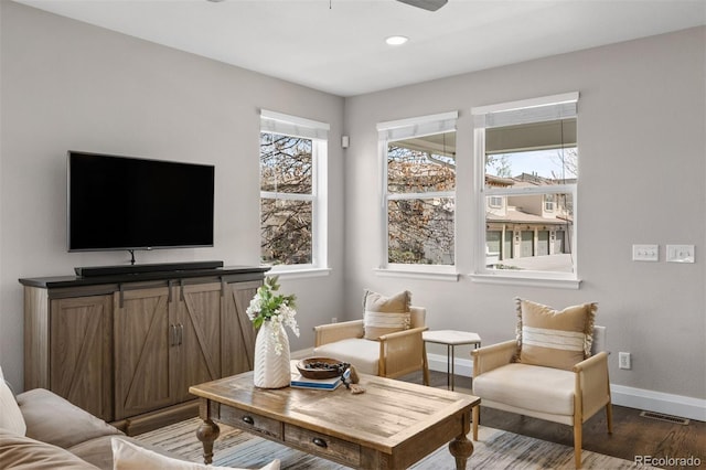 sitting room featuring wood finished floors, visible vents, recessed lighting, a ceiling fan, and baseboards