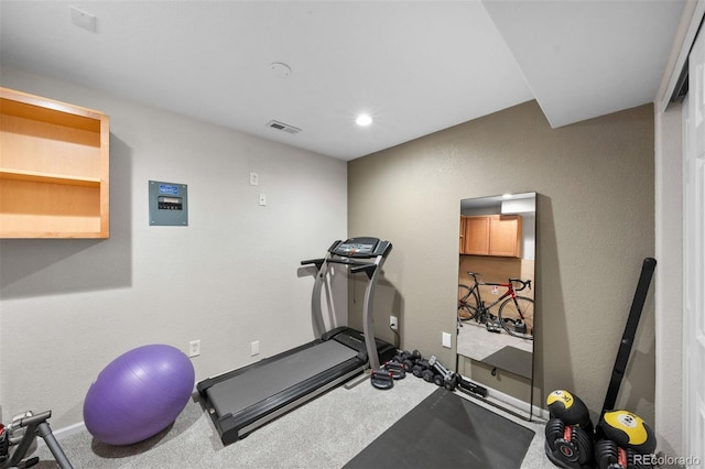 exercise area with baseboards, recessed lighting, visible vents, and carpet