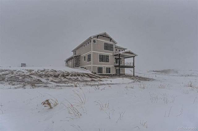 view of snow covered property