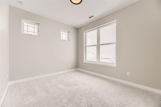 empty room with carpet floors