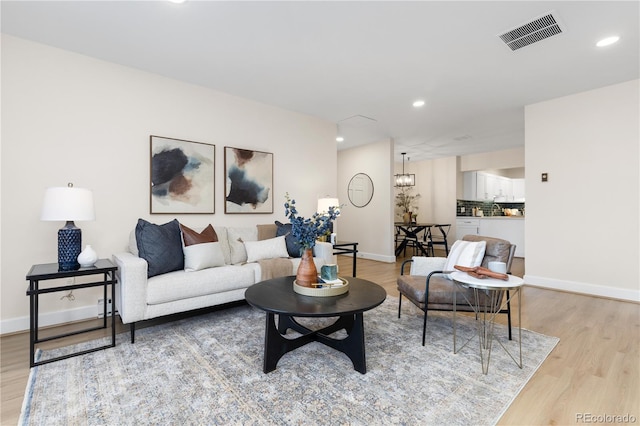 living room featuring light wood-type flooring