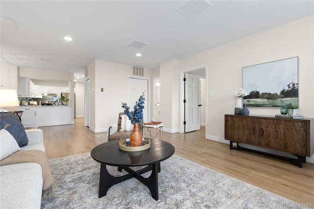 living room featuring light hardwood / wood-style flooring