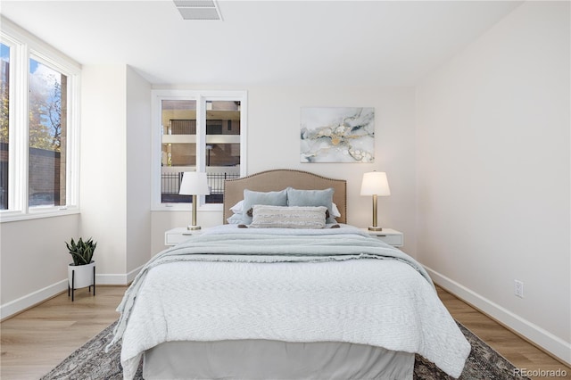 bedroom featuring light hardwood / wood-style flooring