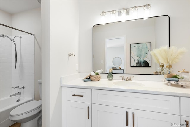 full bathroom with vanity, shower / bath combination, and toilet