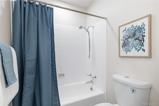 bathroom with shower / bath combo and toilet