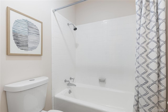 bathroom with shower / bath combination with curtain and toilet